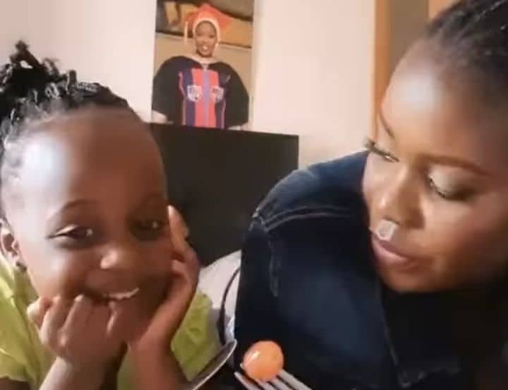 VIDEO: Watch Faridah Nakazibwe on mother duties with Bruno K’s daughter